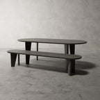 Lumière Bank Ovaal naast de Lumière Ovaal eettafel, beide in zwart eiken